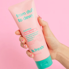Load image into Gallery viewer, A person holding a pink bottle of 'From Dull To Dewy' hydrating body serum